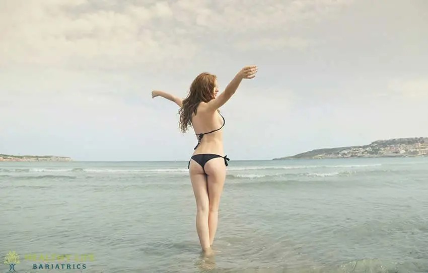 woman in a black bikini