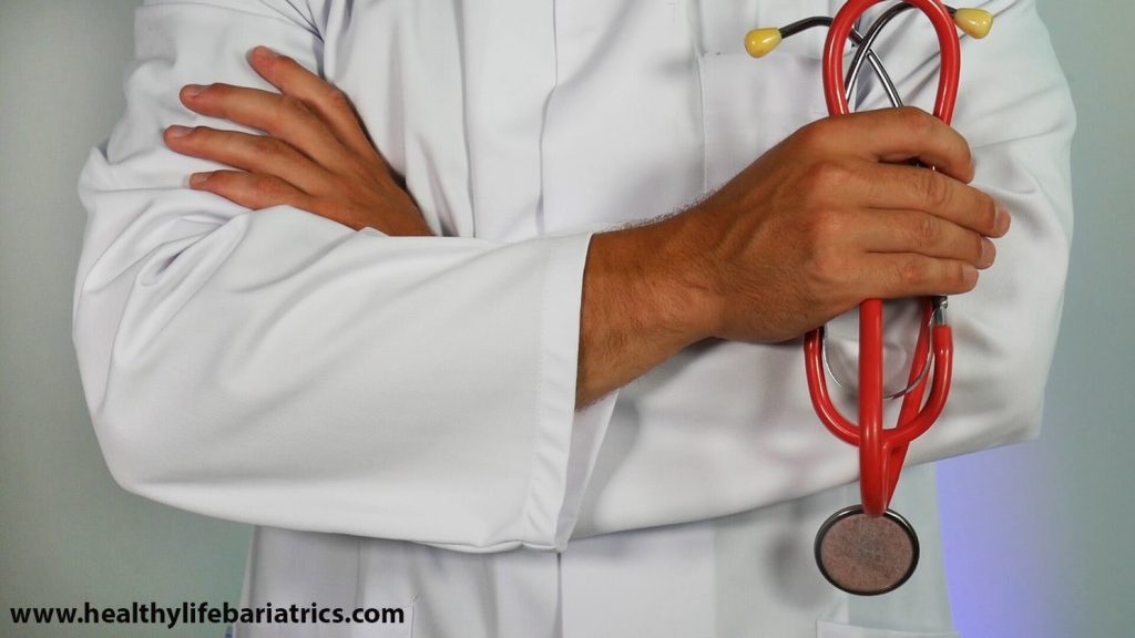 A doctor holding a stethoscope.