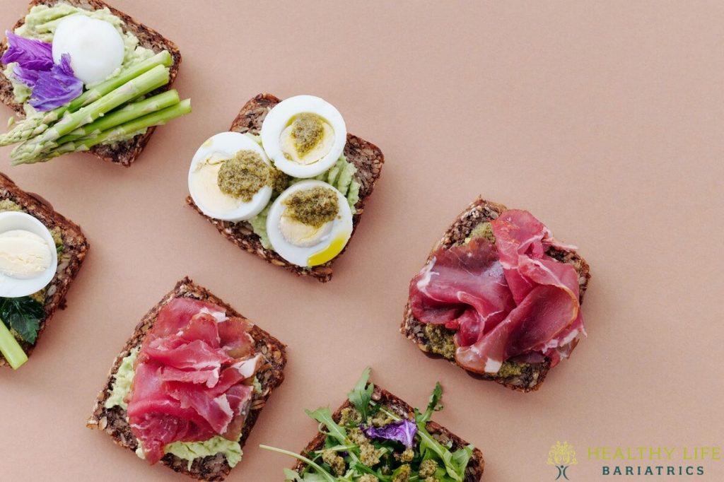 A group of toasts with meat, eggs and vegetables.