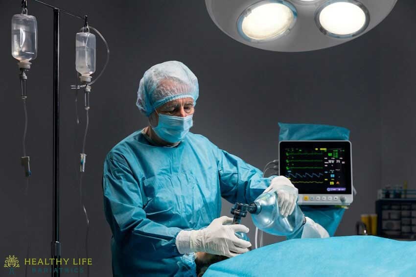 A surgeon is operating on a patient in an operating room.