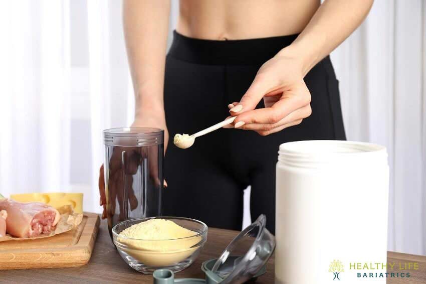 A woman is mixing ingredients on a table.