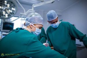 A group of surgeons in an operating room.