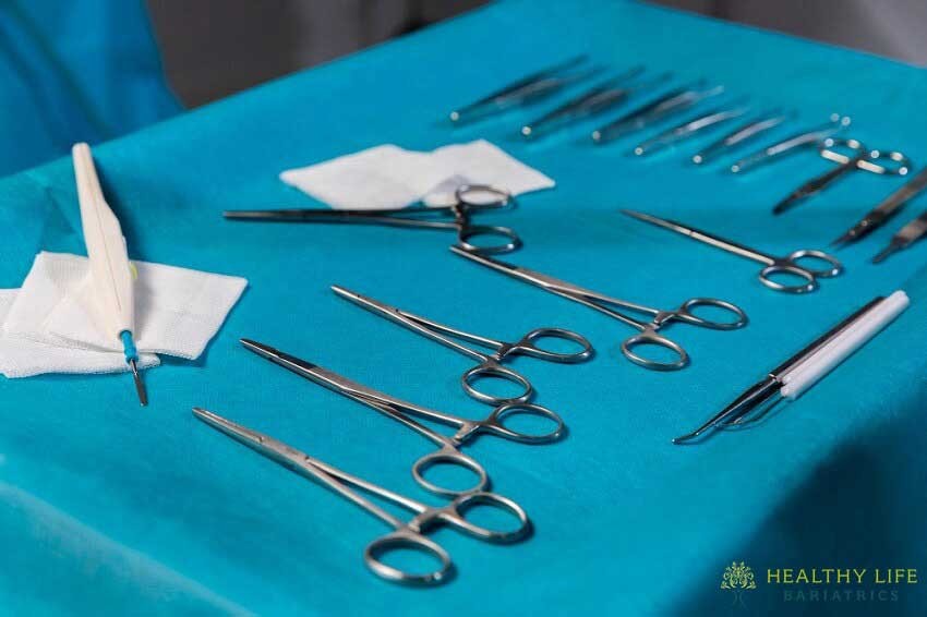 A set of surgical tools on a table.