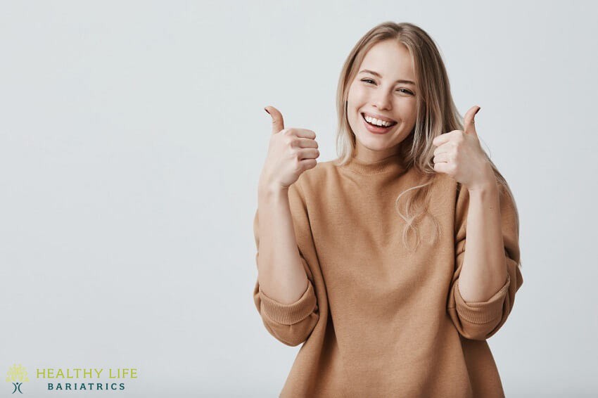 A woman giving a thumbs up with the words healthy life.