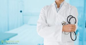 A female doctor holding a stethoscope.