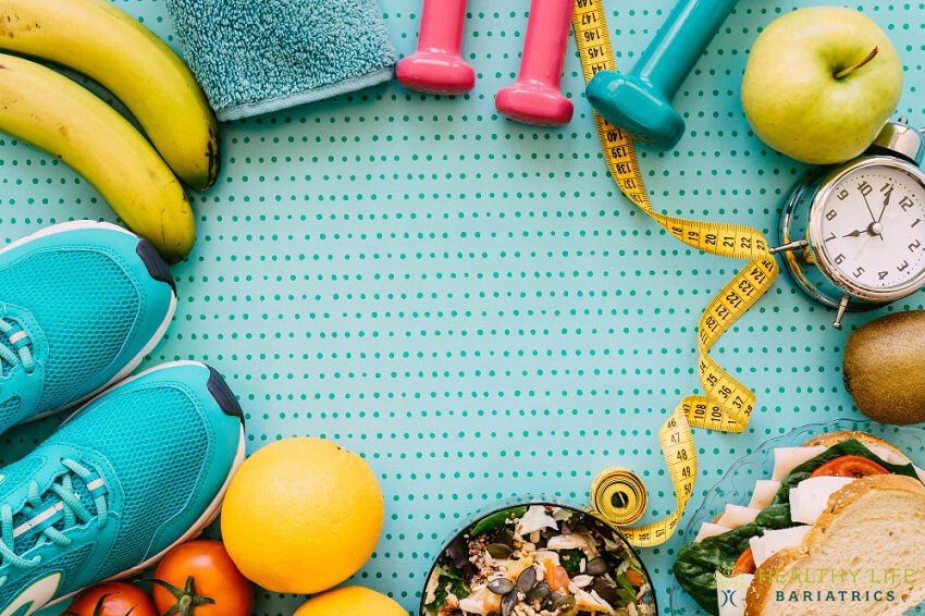 A group of fruits, vegetables, and exercise equipment on a blue background.