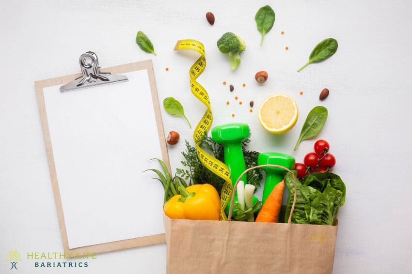 A paper bag with vegetables and a measuring tape.