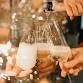 A group of people toasting champagne at an awards party.