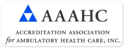 Logo of the accreditation association for ambulatory health care, inc. (aaahc) featuring a blue triangle above the organization's name, specializing in weight loss surgery in Los Angeles.